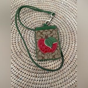 Coach Brown Signature Canvas ID Lanyard with Red Apple and Green Trim